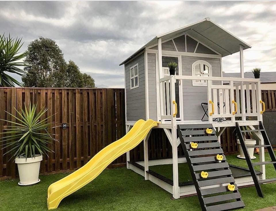 Vivid Backyard Playground with Striped Hammock