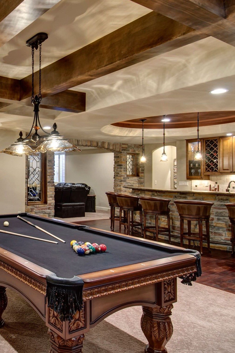 Basement Bar with Dark Wood and Industrial Touches