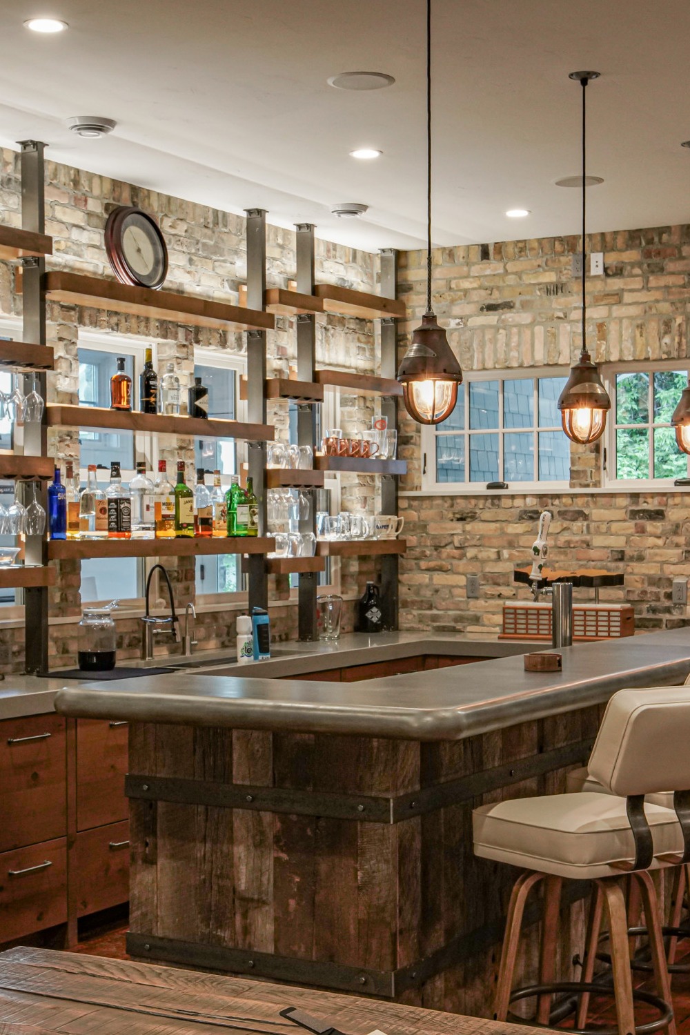 Cozy Basement Bar with Stone and Wood Elements