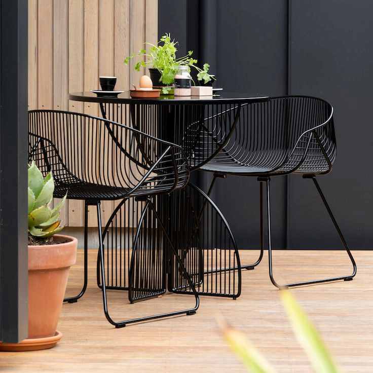 Compact Balcony with Modern Black Cafe Table