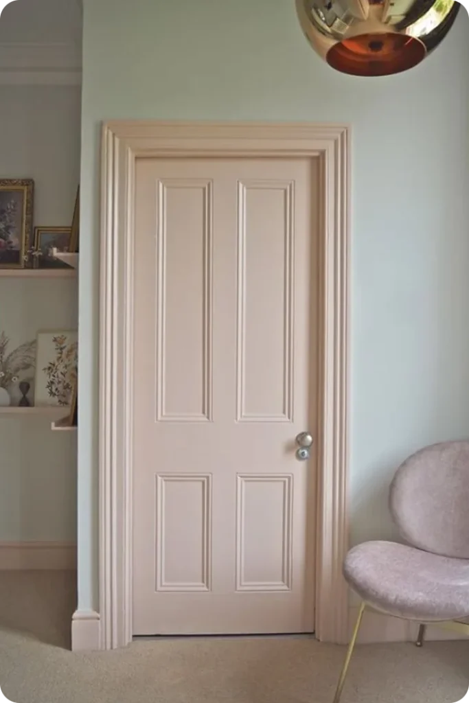 Pale Pink Door with a Whimsical Touch