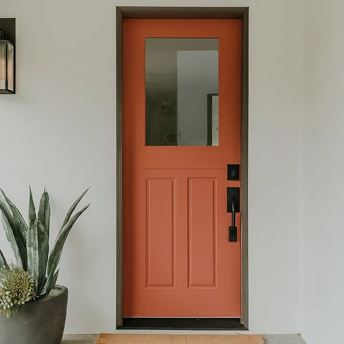 Terracotta Front Door with Earthy Tones