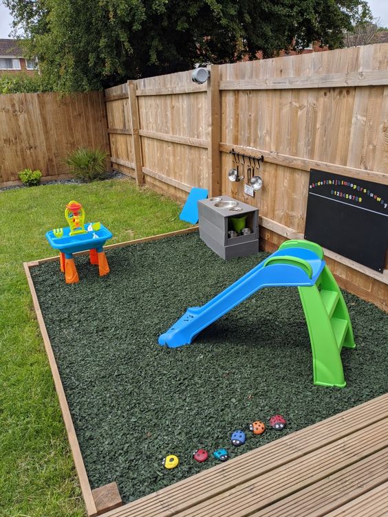 Whimsical Outdoor Mud Kitchen with Vibrant Features