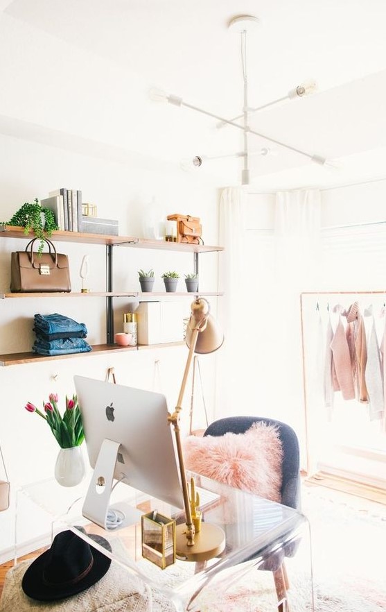 Glamorous Cloffice with Chandelier and Pink Accents