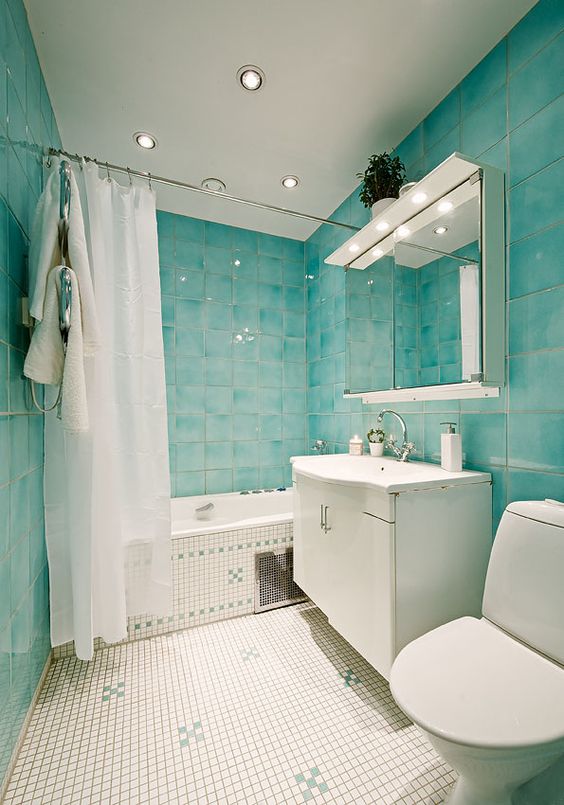 Dreamy Bathroom with Turquoise and Neutral Tiles