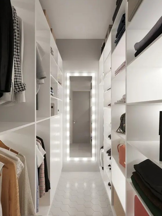 Minimalist White Closet with Illuminated Shelving