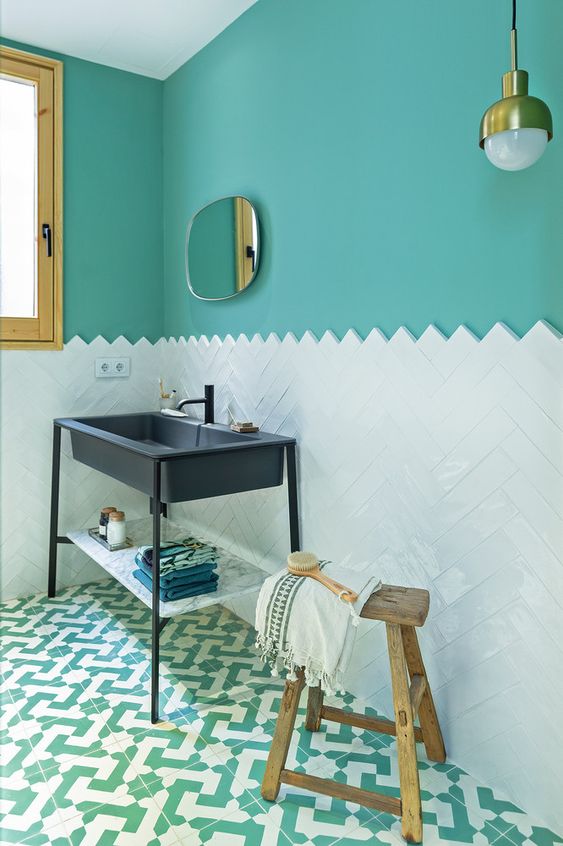 Refined Bathroom with Turquoise Walls and Navy Accents