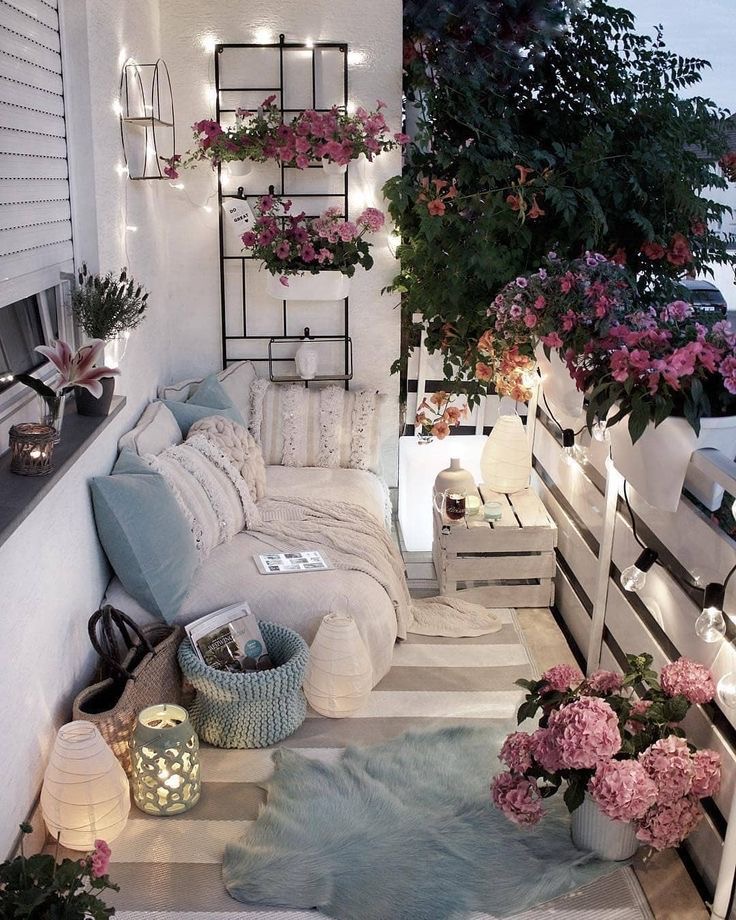 Urban Escape Balcony with Cozy Throws and Rugs