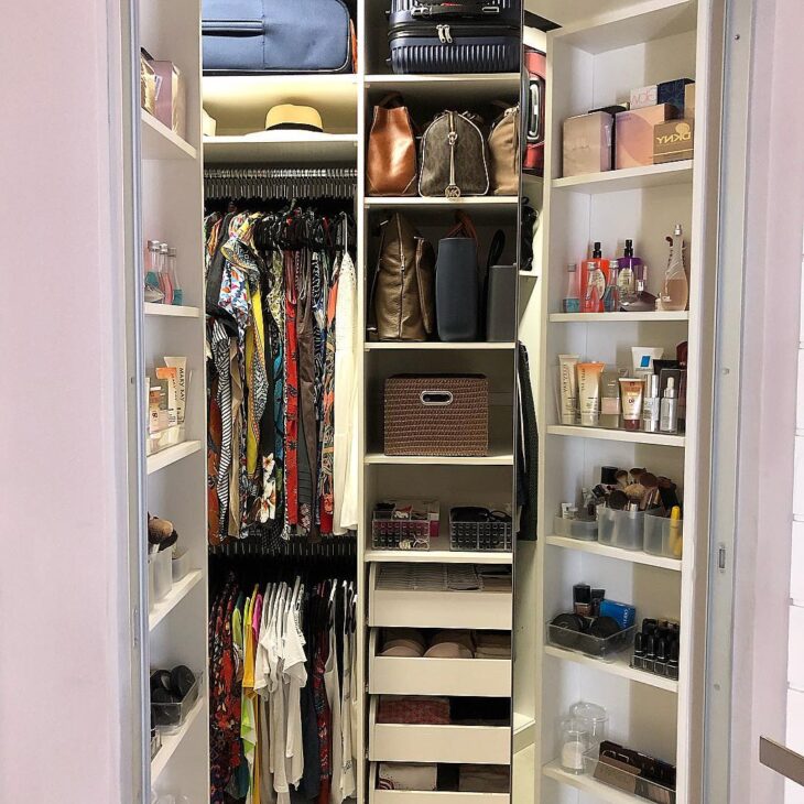 Elegant Feminine Closet with Round Mirror Accents