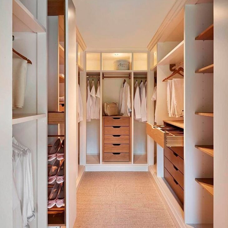 Luxurious Feminine Closet with Bold Gold Features