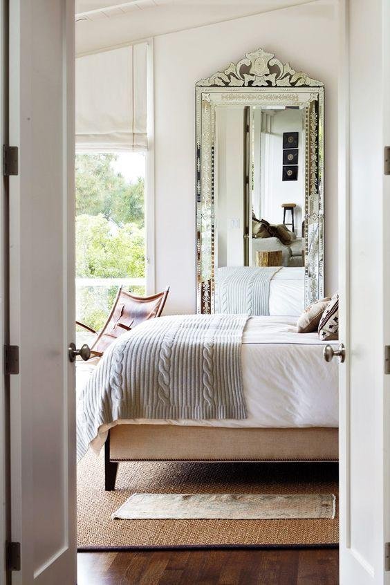 Bedroom Curtains with a Large Mirror for Enhanced Light and Space