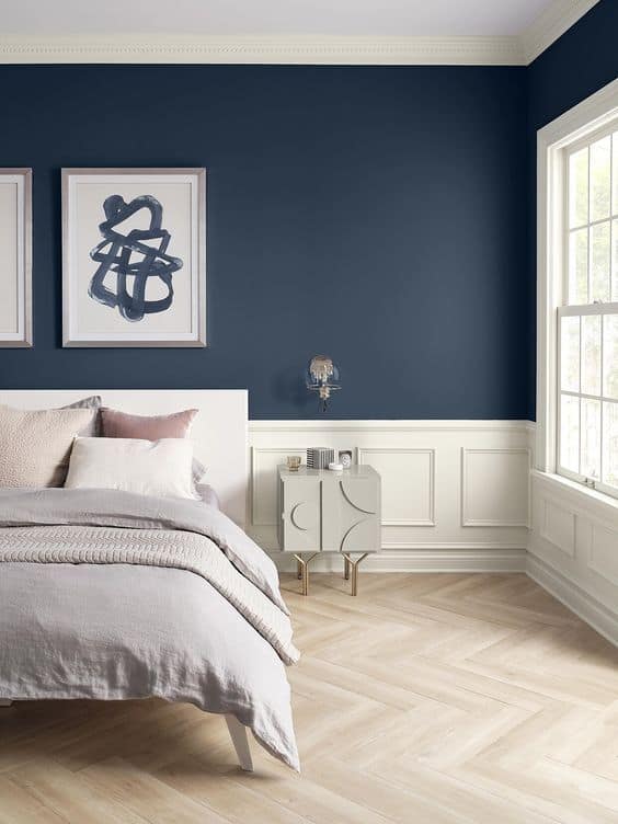 Navy Blue Accent Wall Bedroom with Botanical Accents