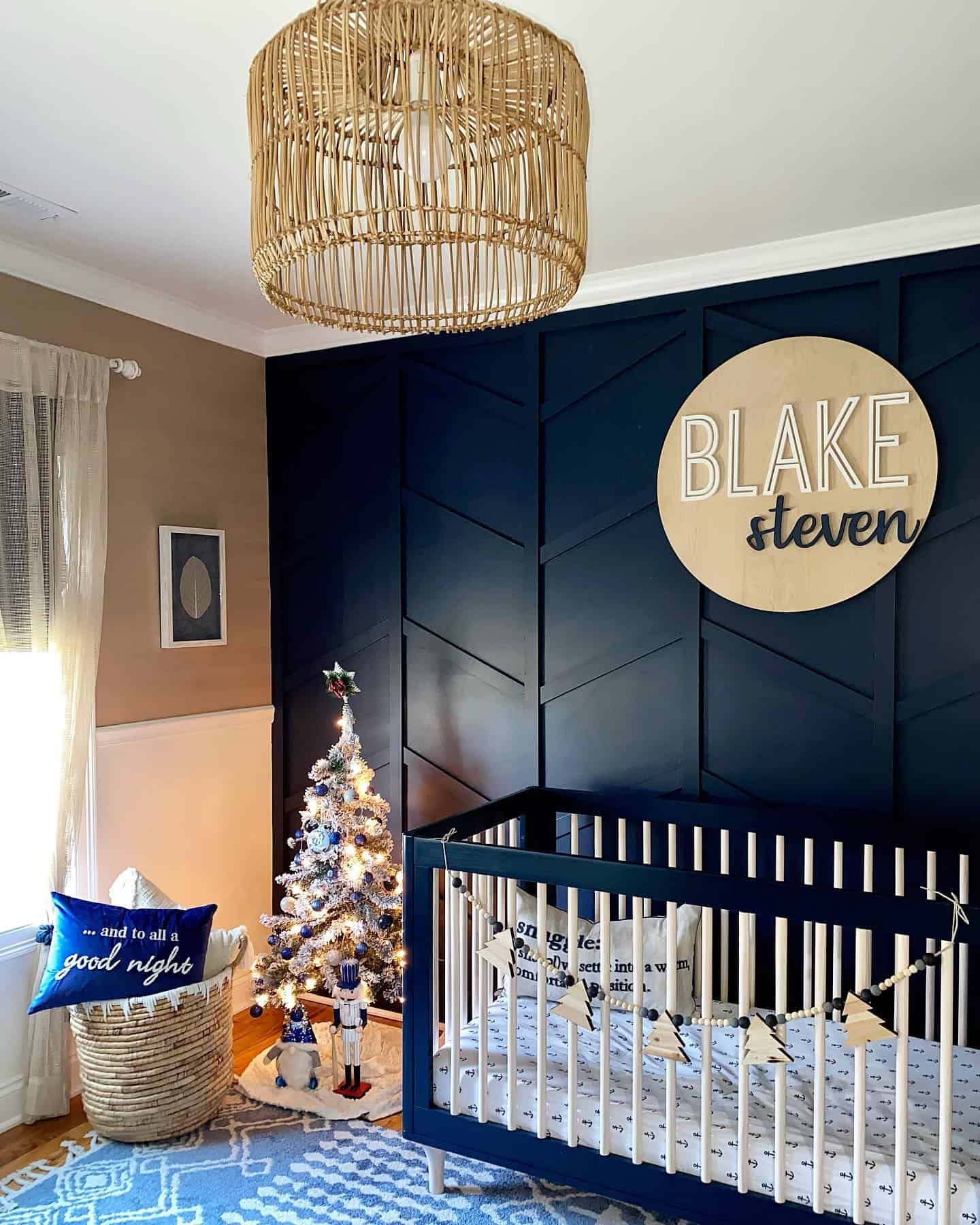 Navy Blue Accent Wall Nursery with Playful Elegance