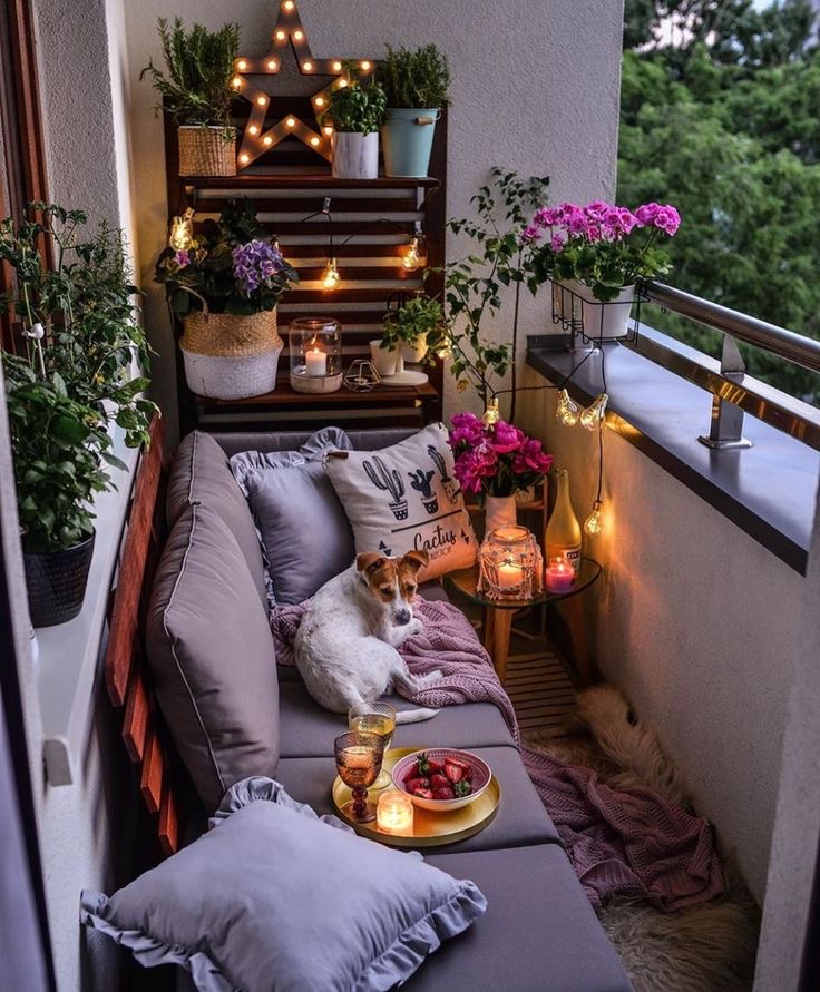 Apartment Balcony with Lush Plants and Wooden Furniture