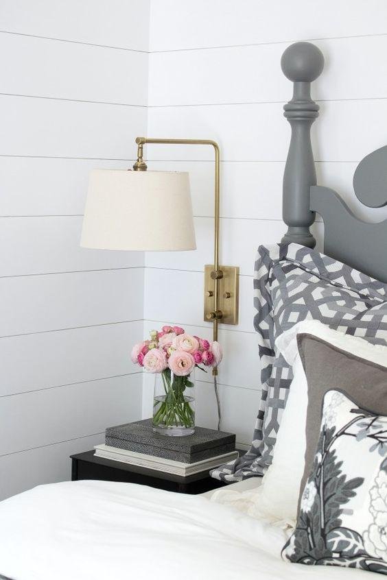 Wall Sconces and Soft Bedroom Curtains for Warm Lighting